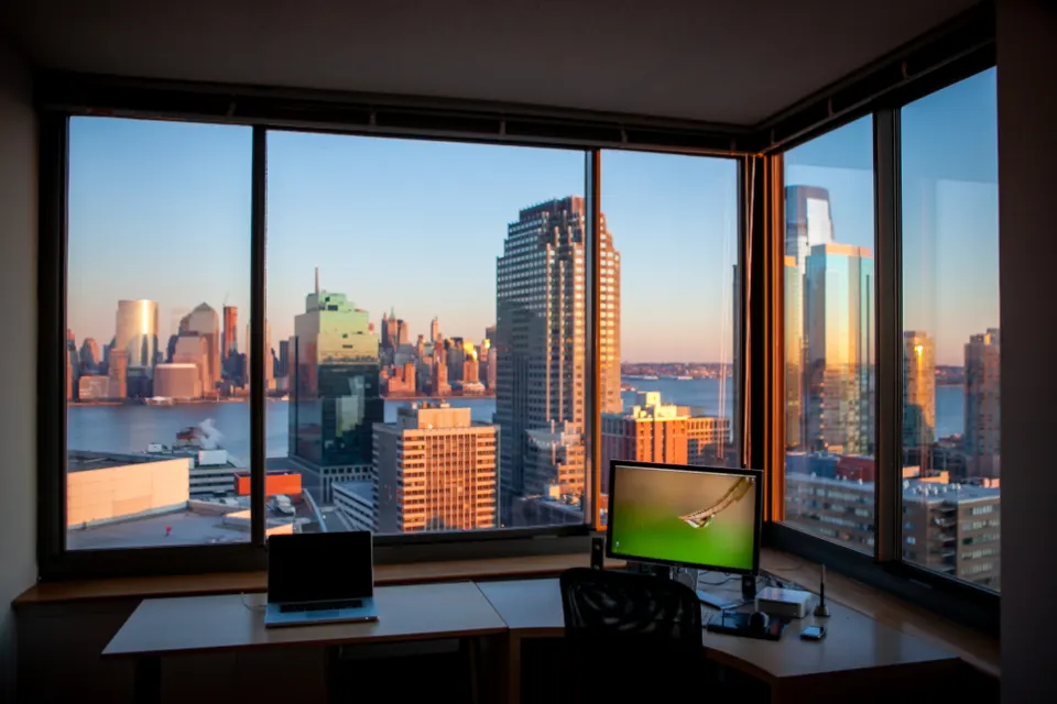 Corner office workspace with panoramic windows