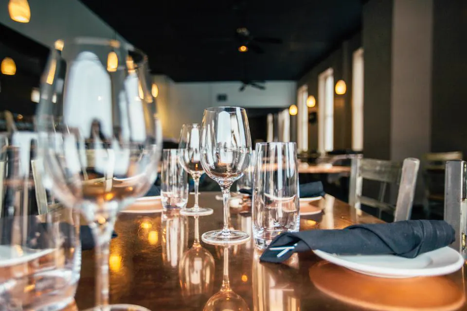 Fine dining restaurant with glassware and warm ambience