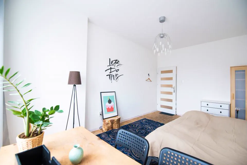 Scandinavian style bedroom and study corner with plants