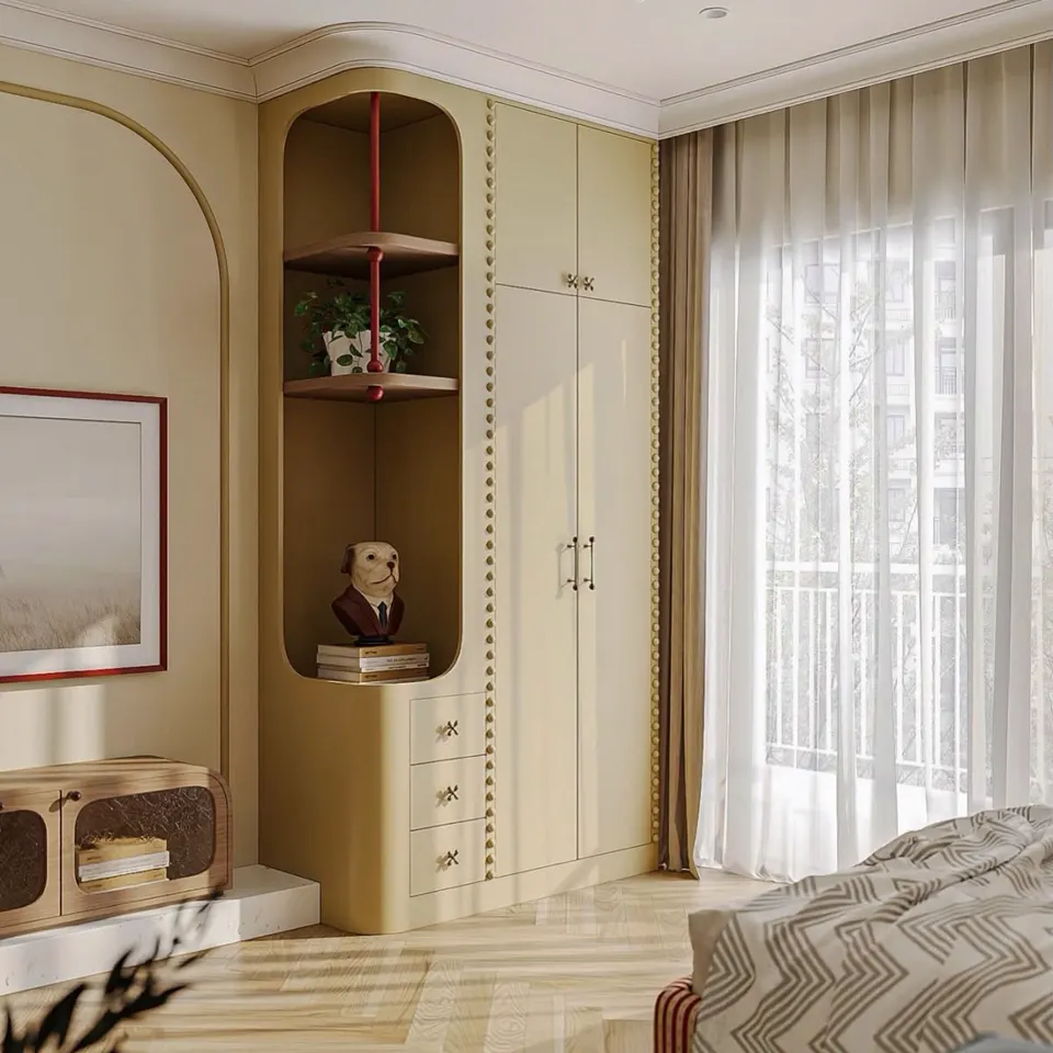 Bedroom interior with arched display niche, sheer curtains and built-in storage